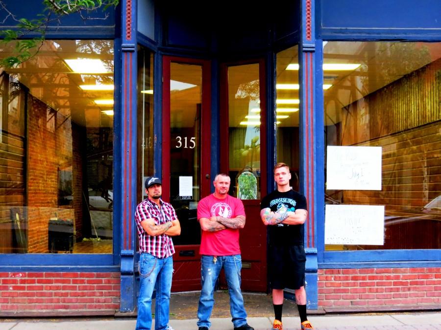 Kittitas County residents and co-owners of The Roost, Clayton Merritt, Tony Ritter, and Jared Carter stand outside their new tattoo shop.