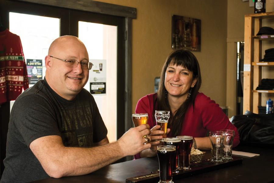 Visitors from Richland, Washington, Ronnie (left) and Jodi (right) Dawson enjoy a sampler at Iron Horse brewery.