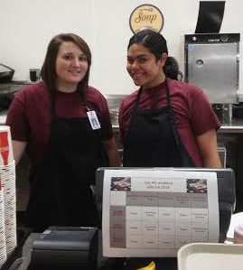 Chanessa Knight (left) and Meleane Finau (right) work through the summer in the SURC's Wrap & Roll.
