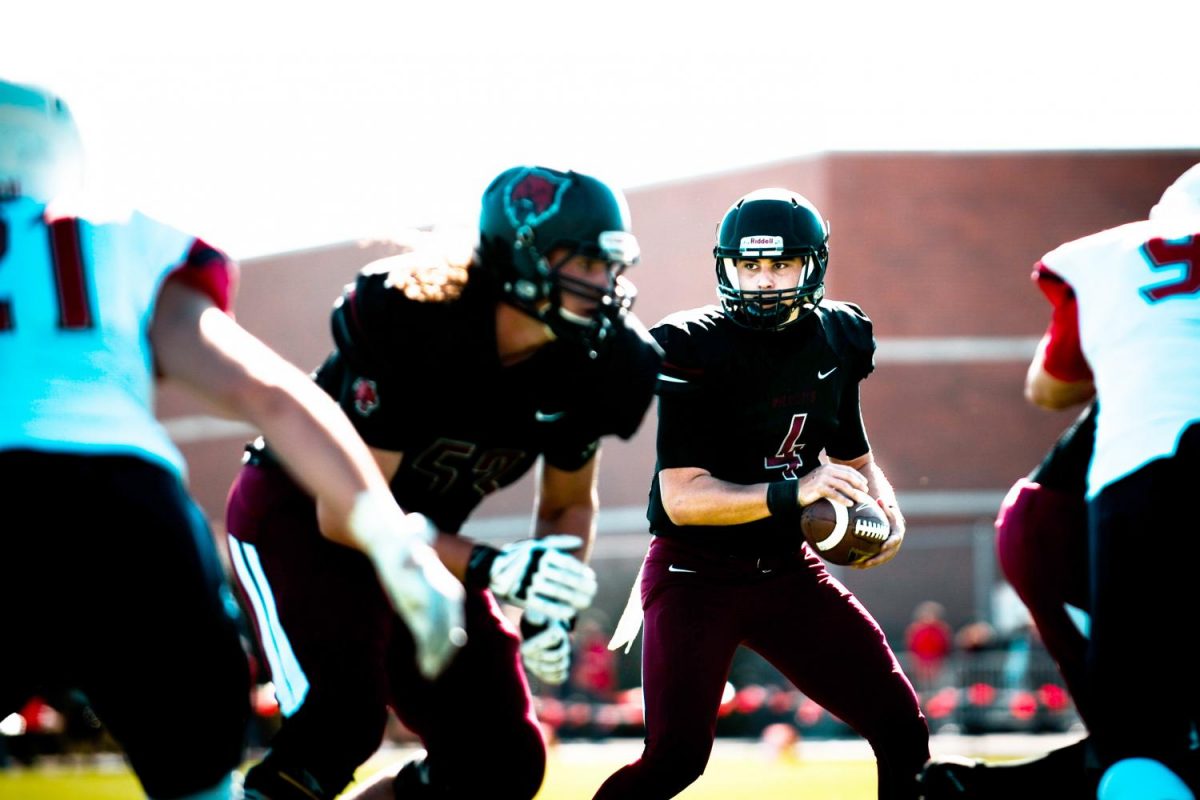Reilly Hennessey considers his next move during the Sept. 30 game against Simon Fraser. CWU won the game 62-0.