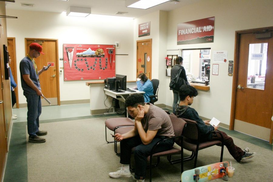 Students wait at the Financial Aid office.