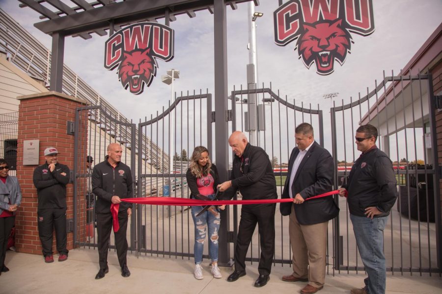 ASCWU President Edith Rojas and CWU President James Gaudino officially reopen Tomlinson Stadium with the cutting of the ribbon.