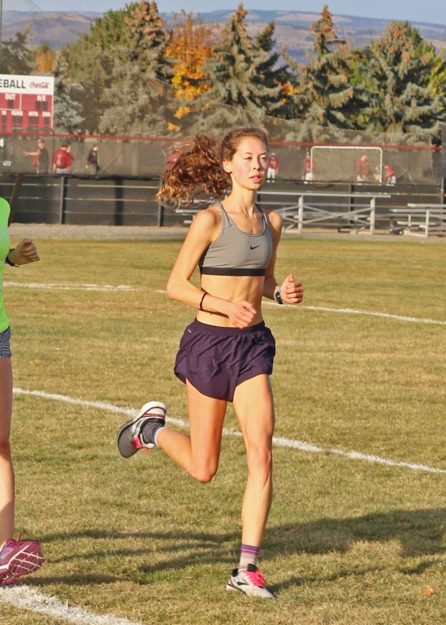 Nicole Soleim (Freshman) helps lead the pack of distance runners on CWUs athletic fields.