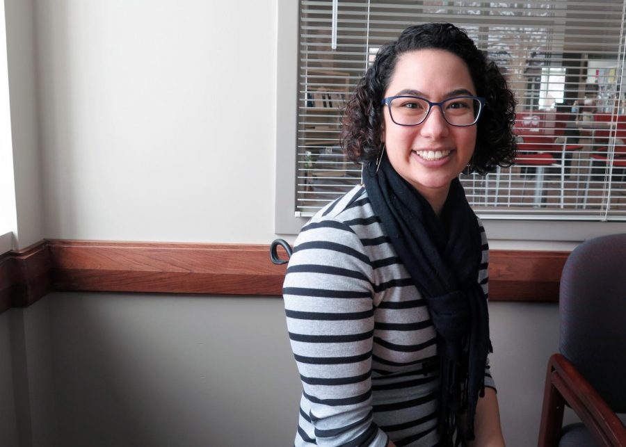 Abby Chien, of the Diversity and Equity Center, sits in her new office as she takes action in her position as Director.