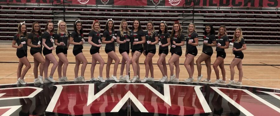 At the center of Nicholson Pavillon stands the 2019-20 CWU cheerleading team. Each student who made the team was given a red rose. Cheer preform at every basketball and football event, rain or shine.
