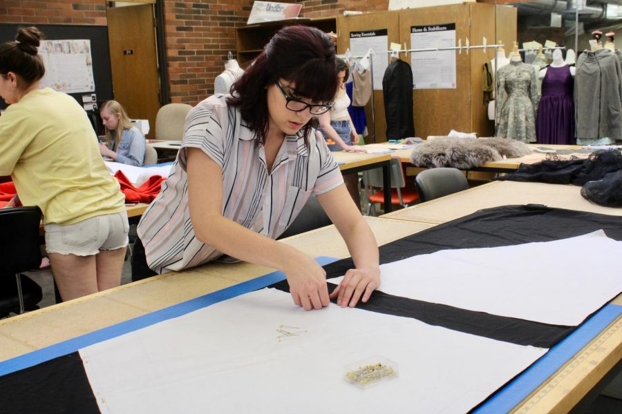 Oren Hilligso works on her garments for the upcoming 23rd Annual Fashion Show. Students will be presenting their original designs at show, which will take place June
1 at 3 p.m. and 7 p.m. at the Milo Smith Tower Theatre.