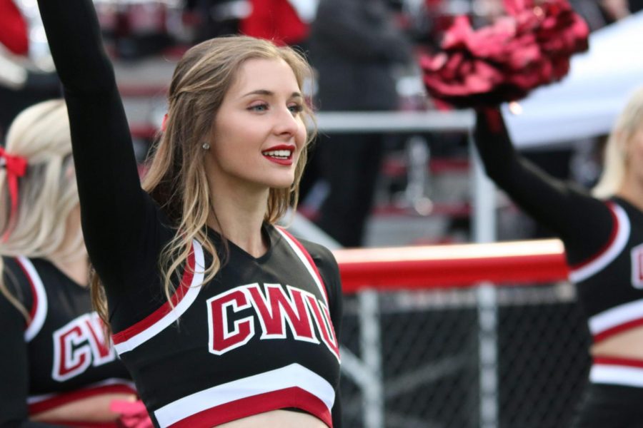 CWU Cheerleader and Dancer, Amelia Elliot, cheering at a CWU’s homecoming football game in 2019. The team looks forward to cheering again.