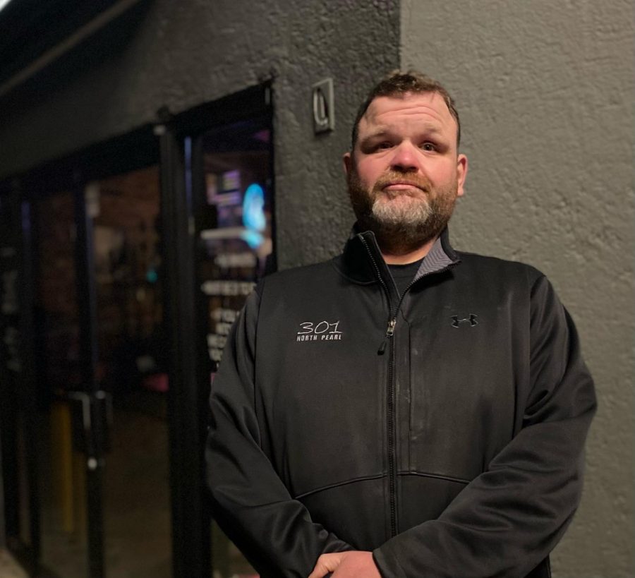 Serving as security, Hartless ensures patrons enter Club 301 legally.