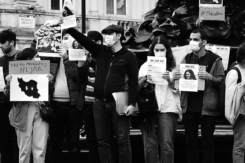 Photos taken at a protest at Londons Piccadilly Circus against mandatory hijab in Iran.