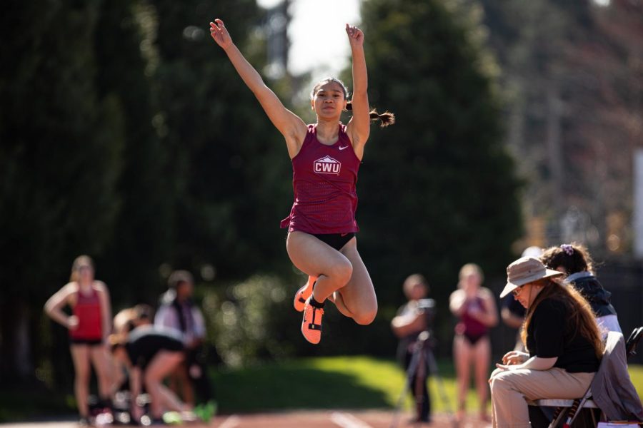 Erica Cabanos mid-jump. Photo courtesy of Jacob Thompson: Thompson Sports Media