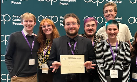 The Observer staff with their award. 